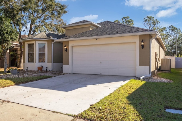 ranch-style home featuring cooling unit, concrete driveway, an attached garage, and stucco siding