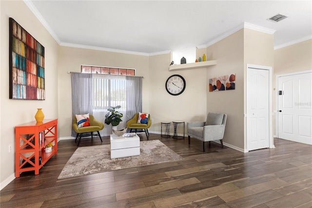 living area featuring crown molding and dark wood-type flooring