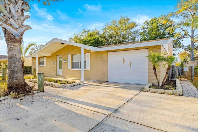 single story home featuring a garage