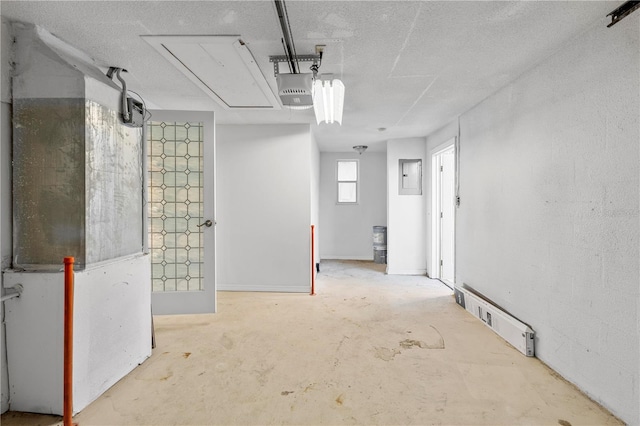 basement featuring a textured ceiling