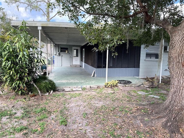 exterior space featuring a carport