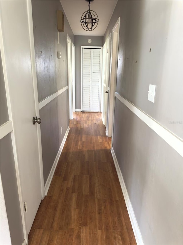 hall with dark hardwood / wood-style floors