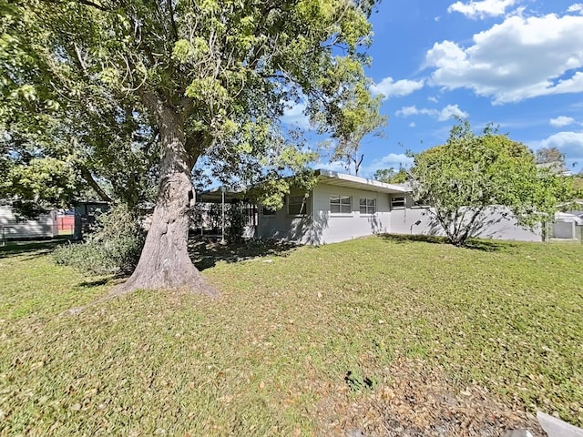 view of yard featuring fence