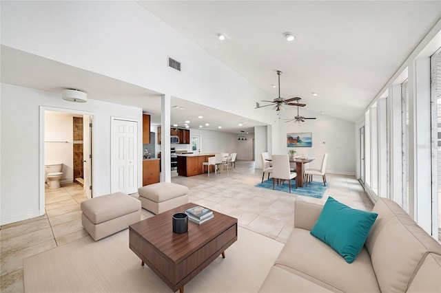 living room with light tile patterned floors, recessed lighting, visible vents, ceiling fan, and high vaulted ceiling