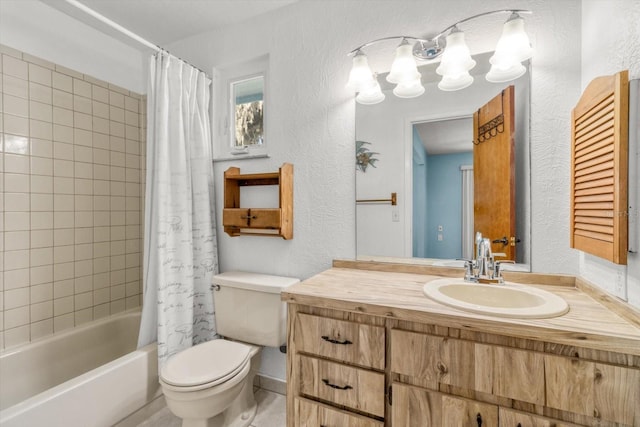 full bathroom with vanity, toilet, and shower / tub combo