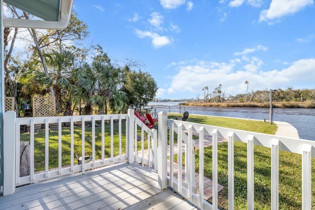 balcony with a deck with water view