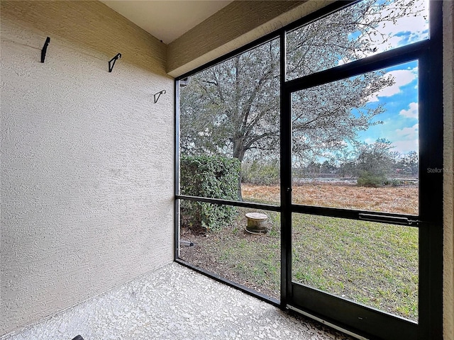 view of unfurnished sunroom