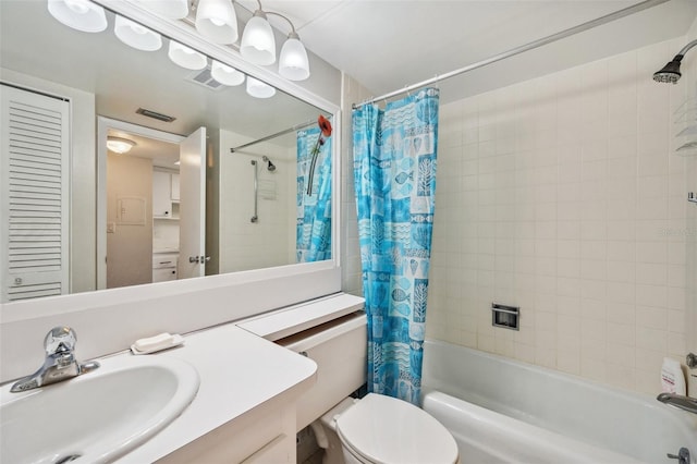 full bathroom with vanity, toilet, and shower / bath combo