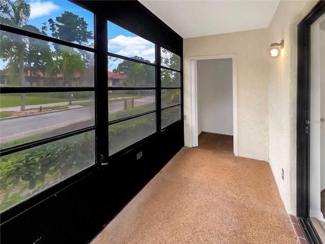 view of unfurnished sunroom