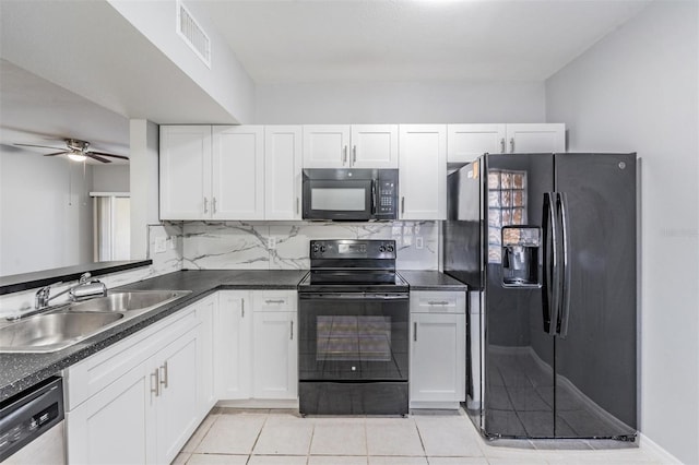 kitchen featuring sink, ceiling fan, backsplash, black appliances, and white cabinets