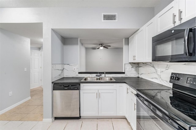 kitchen featuring sink, black electric range oven, white cabinets, stainless steel dishwasher, and ceiling fan