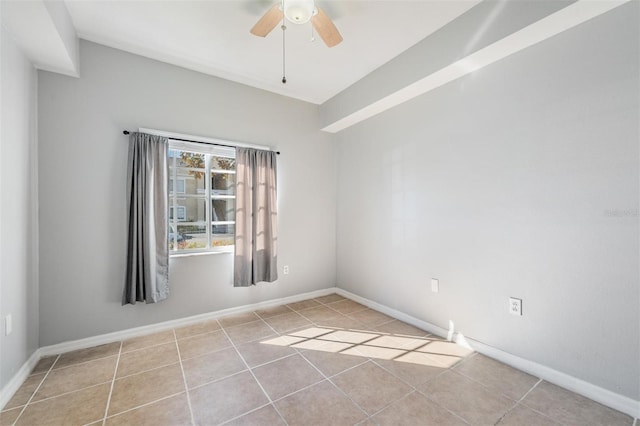 tiled empty room with ceiling fan