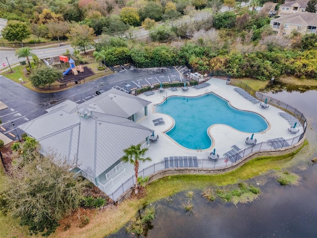 birds eye view of property featuring a water view