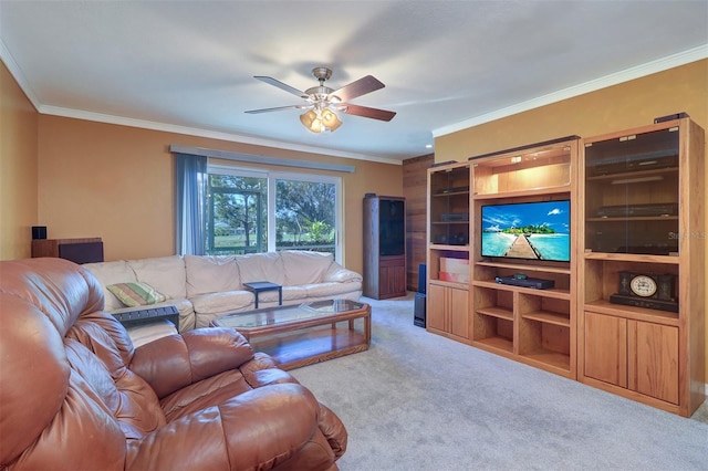 living room with ornamental molding, light colored carpet, and ceiling fan