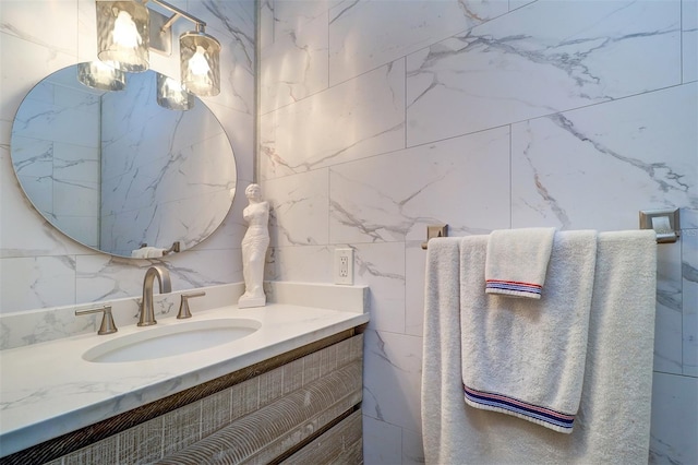 bathroom with vanity and backsplash