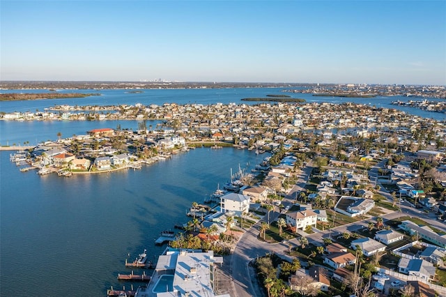 bird's eye view with a residential view and a water view