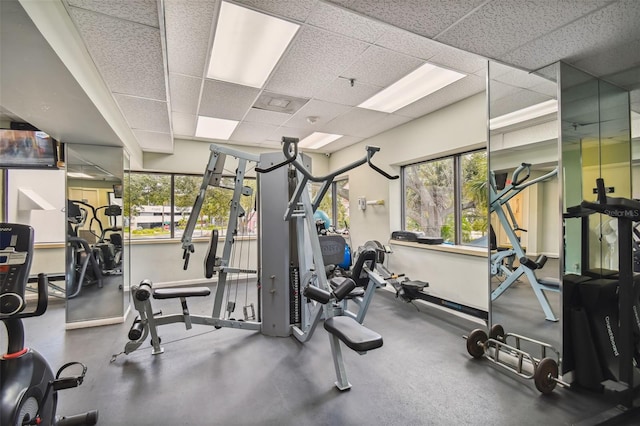 workout area featuring a drop ceiling