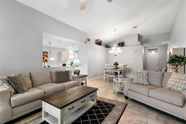 living room featuring vaulted ceiling, ceiling fan with notable chandelier, and a textured ceiling