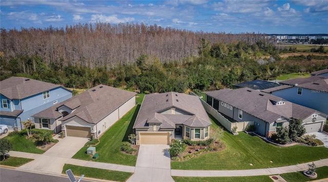 7580 Pool Compass Loop, Wesley Chapel, FL 33545 - birds eye view of property with a view of trees and a residential view