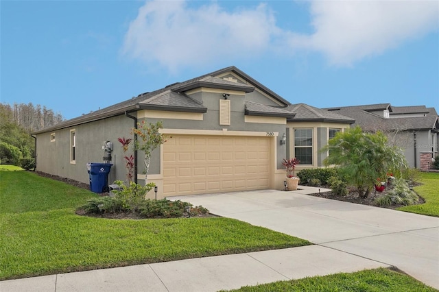 7580 Pool Compass Loop, Wesley Chapel, FL 33545 - view of front of property with stucco siding, an attached garage, driveway, and a front lawn