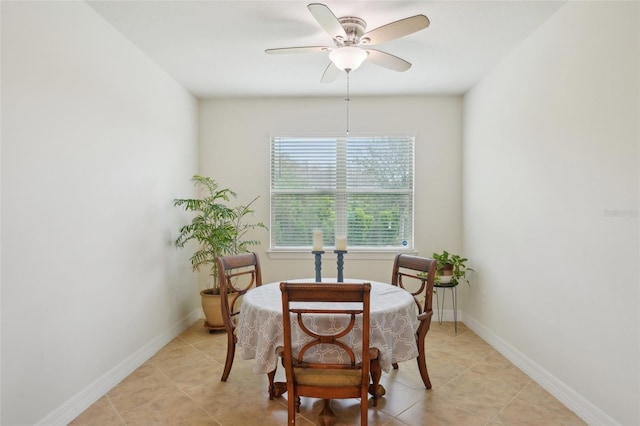 7580 Pool Compass Loop, Wesley Chapel, FL 33545 - dining room with light tile patterned flooring, ceiling fan, and baseboards