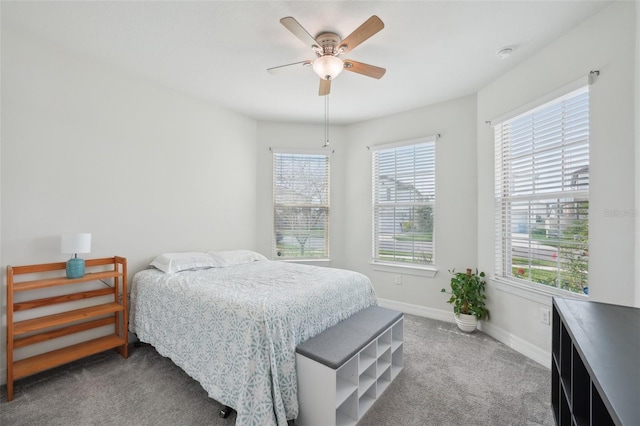 7580 Pool Compass Loop, Wesley Chapel, FL 33545 - carpeted bedroom featuring baseboards and ceiling fan