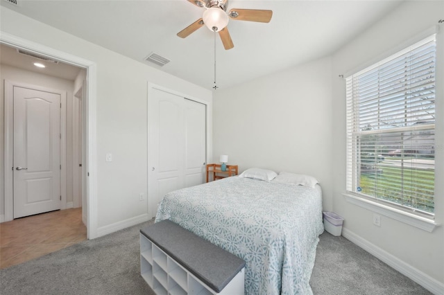 7580 Pool Compass Loop, Wesley Chapel, FL 33545 - bedroom featuring carpet floors, baseboards, visible vents, and a closet
