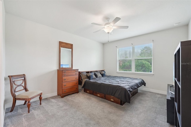 7580 Pool Compass Loop, Wesley Chapel, FL 33545 - bedroom with baseboards, light carpet, and a ceiling fan