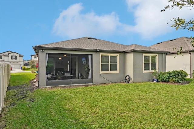 7580 Pool Compass Loop, Wesley Chapel, FL 33545 - back of property with a lawn, a shingled roof, a sunroom, and stucco siding