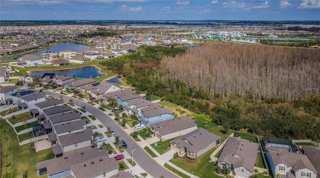 7580 Pool Compass Loop, Wesley Chapel, FL 33545 - drone / aerial view featuring a water view and a residential view