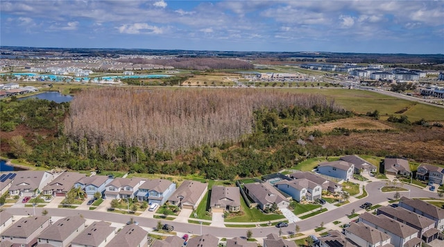 7580 Pool Compass Loop, Wesley Chapel, FL 33545 - drone / aerial view featuring a residential view and a water view