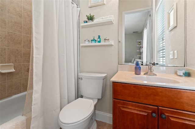 full bathroom with vanity, toilet, and shower / bath combo with shower curtain