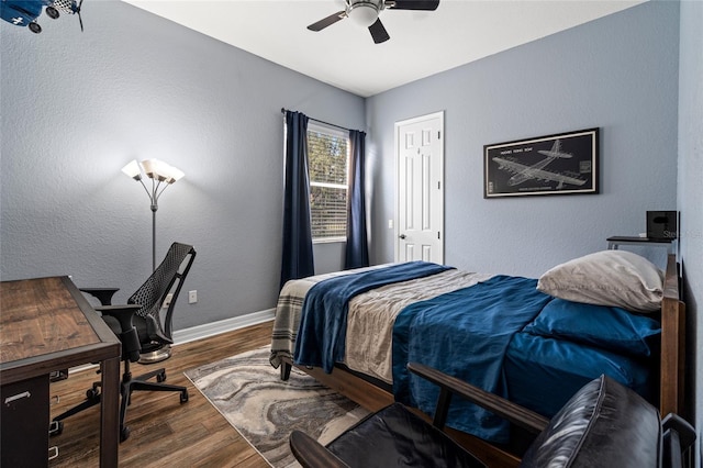 bedroom featuring ceiling fan and hardwood / wood-style floors