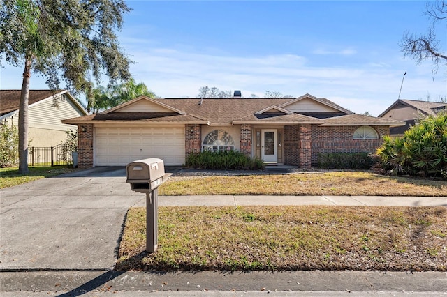 ranch-style house featuring a garage