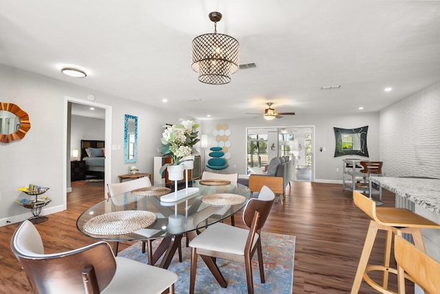 dining area featuring dark hardwood / wood-style floors and ceiling fan