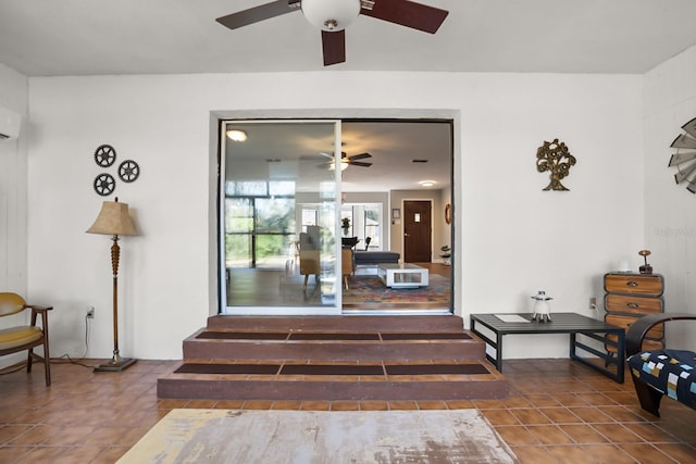 entrance to property with a wall mounted AC and a patio area