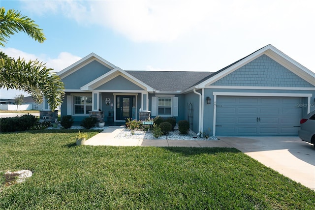 craftsman inspired home featuring a garage, covered porch, and a front lawn