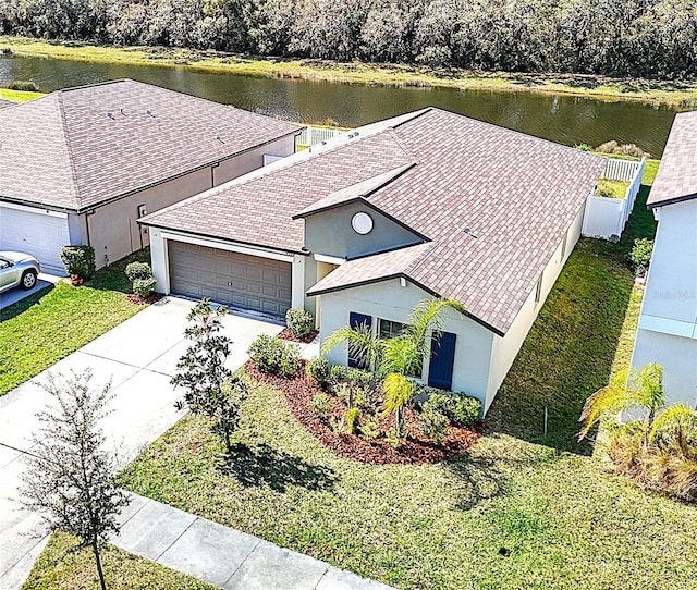 drone / aerial view featuring a water view