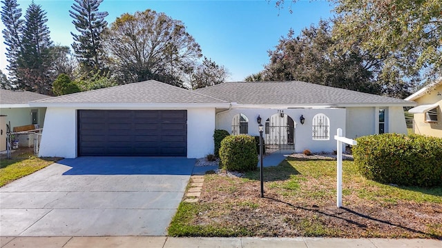 single story home featuring a garage