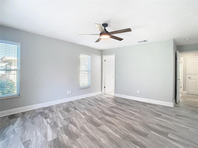 empty room featuring ceiling fan