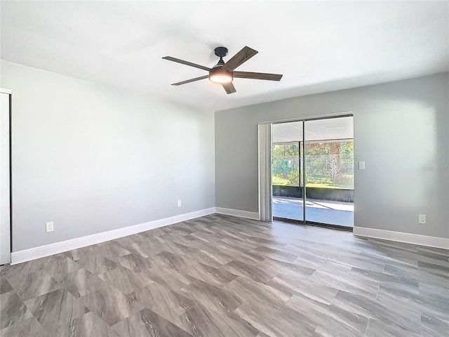 unfurnished room featuring ceiling fan