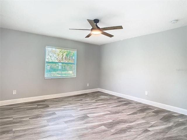 empty room featuring ceiling fan