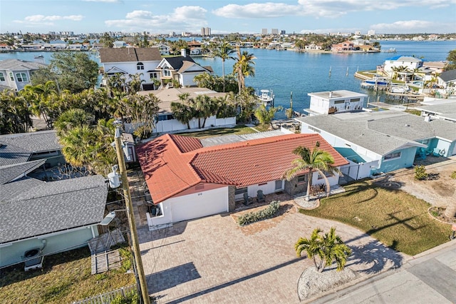 birds eye view of property featuring a water view