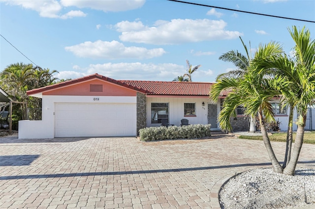 view of front of home featuring a garage