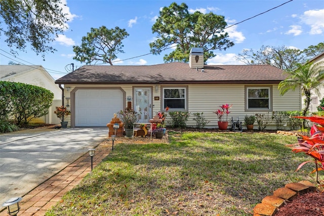 single story home with a garage and a front lawn