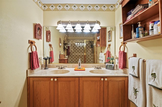 bathroom with vanity and a shower with shower door