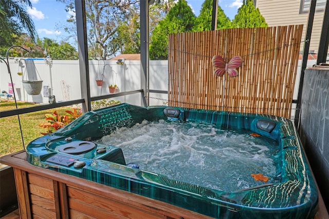 exterior space featuring a jacuzzi