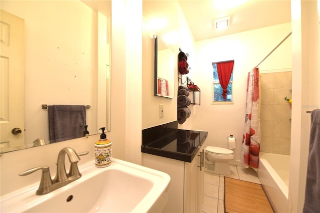 full bathroom with tile patterned flooring, sink, toilet, and shower / tub combo with curtain