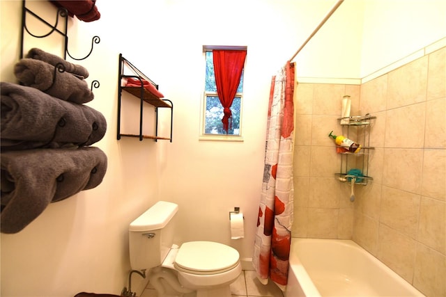 bathroom with toilet and shower / bath combo