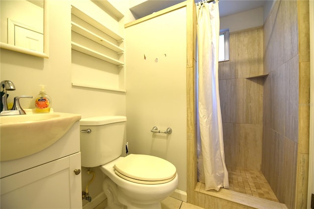 bathroom featuring vanity, toilet, and walk in shower